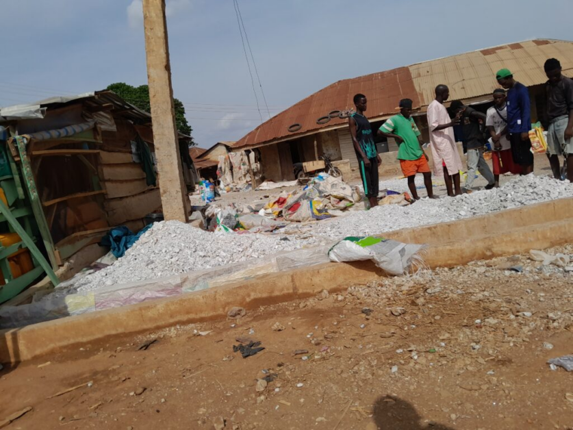 Some young men at a collection centre at Bani market, Bani
Photo Credit: Sodeeq Atanda/FIJ