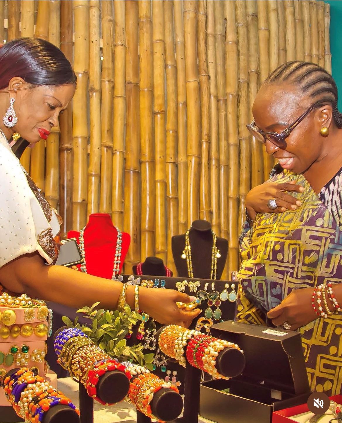 Mrs Janet Adeyemi inspecting precious minerals and gems at the 3rd Annual Gold and Gemstone Conference