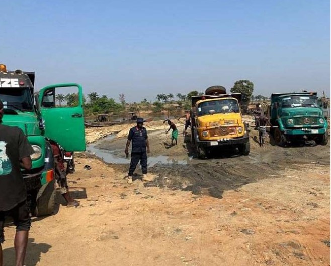 Trucks at illegal Mining site in Anambra by the NSCDC Photo source the Nigerian Voice