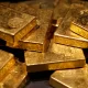 Dollar Sinks, Gold Soars Amid Trump’s Tariff Offensive and Fed Clash